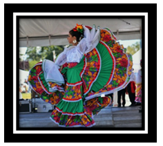 A hispanic woman dancing in a traditional dress